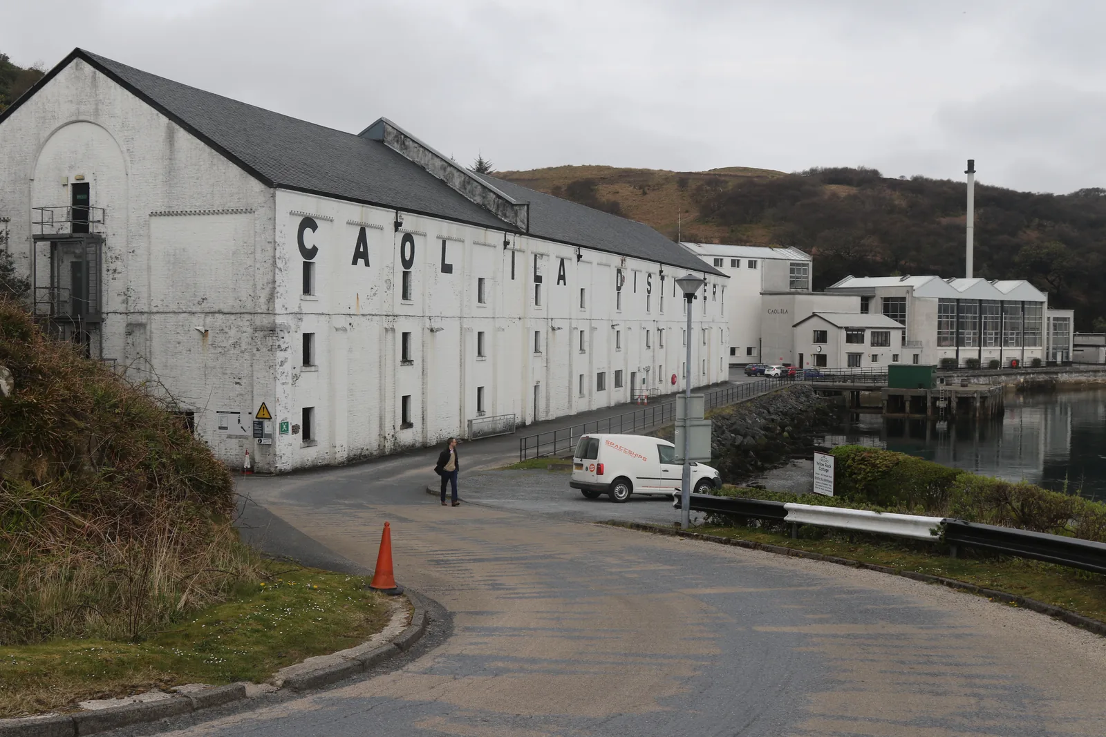 Coastal approach to Caol Ila distillery on Islay with the Sound of Islay beyond